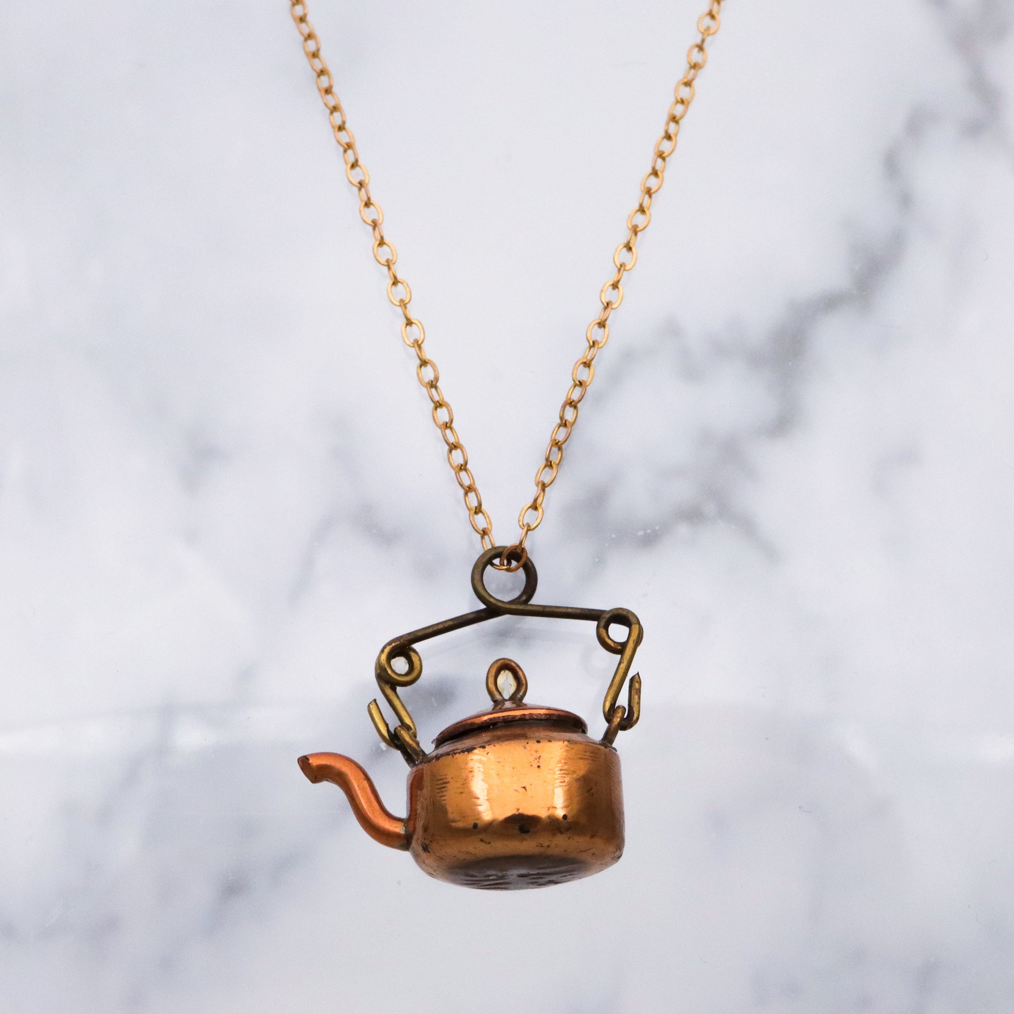 Pair of antique early 20th century prisoner made wheat penny copper tea kettles